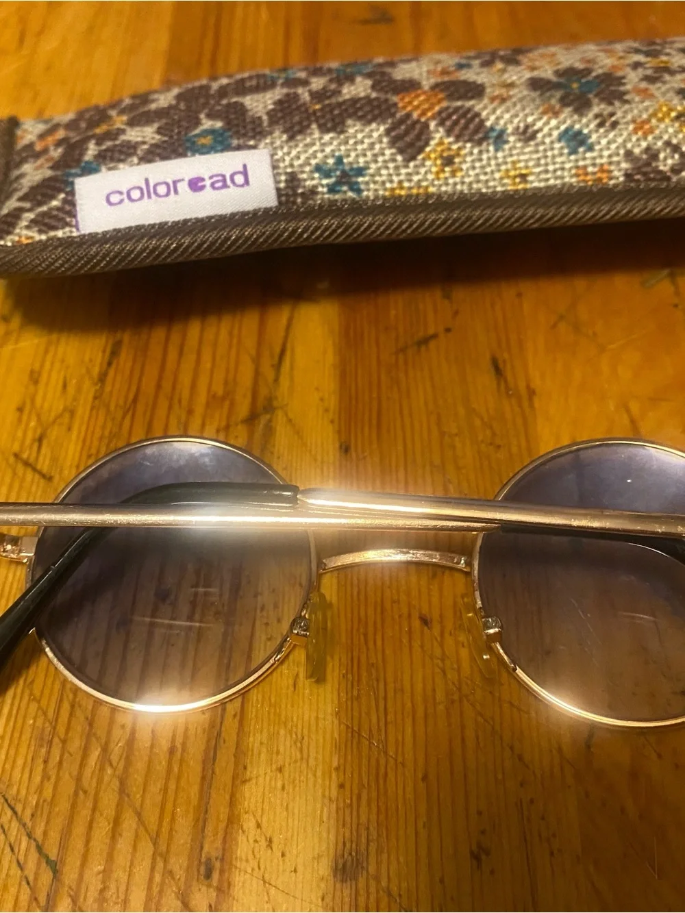 Round Gold Frame Sunglasses with Light Blue Tint